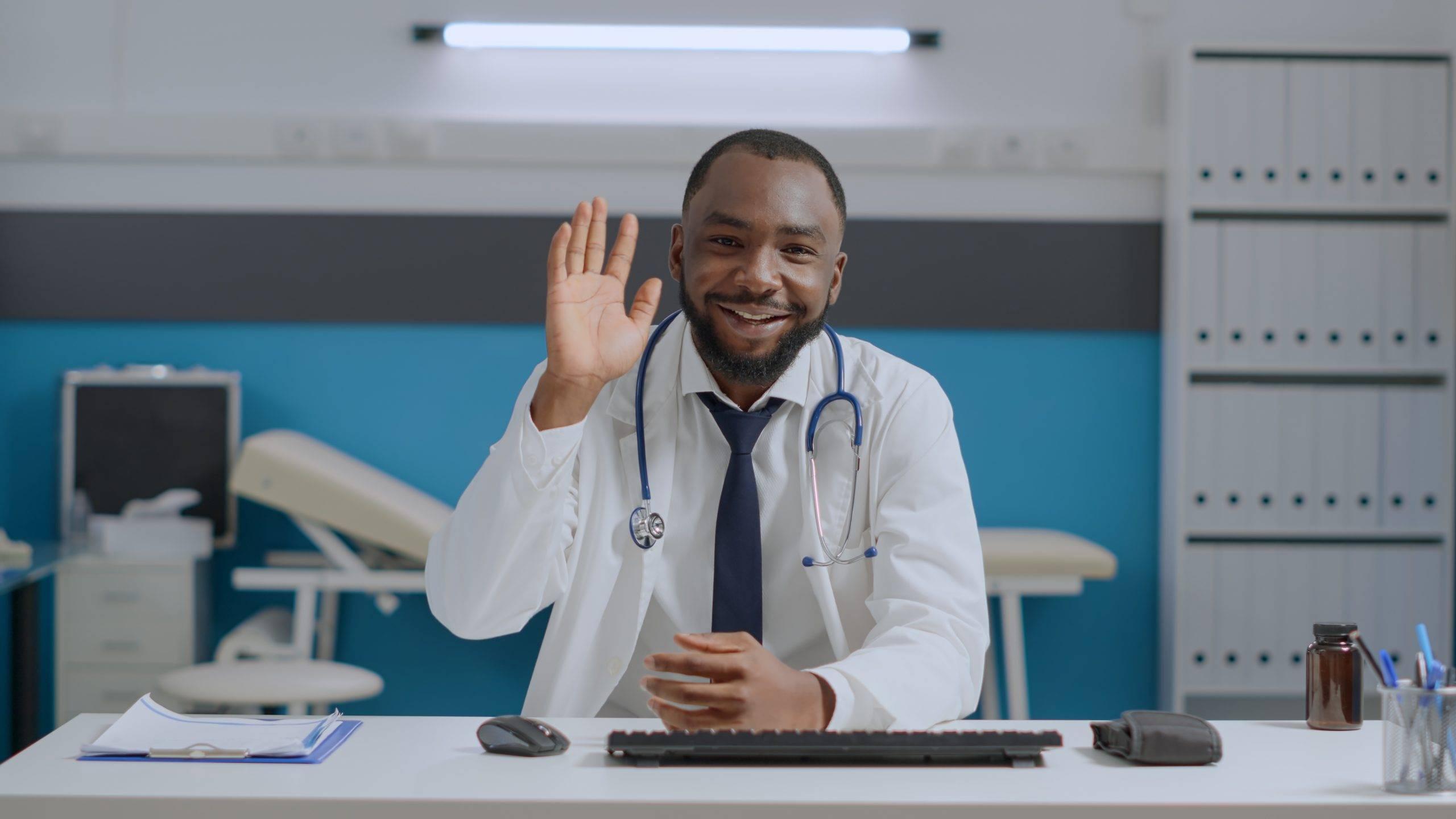 Young African American doctor on a video conference with a patient.